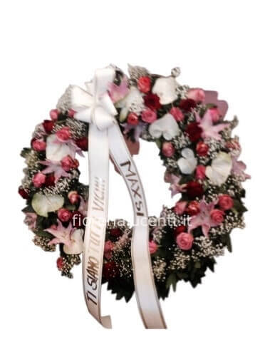 Corona funebre diametro 50 cm ,colori da concordare.